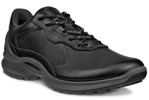 A black leather athletic shoe with black laces, perforated accents and a thick sole.