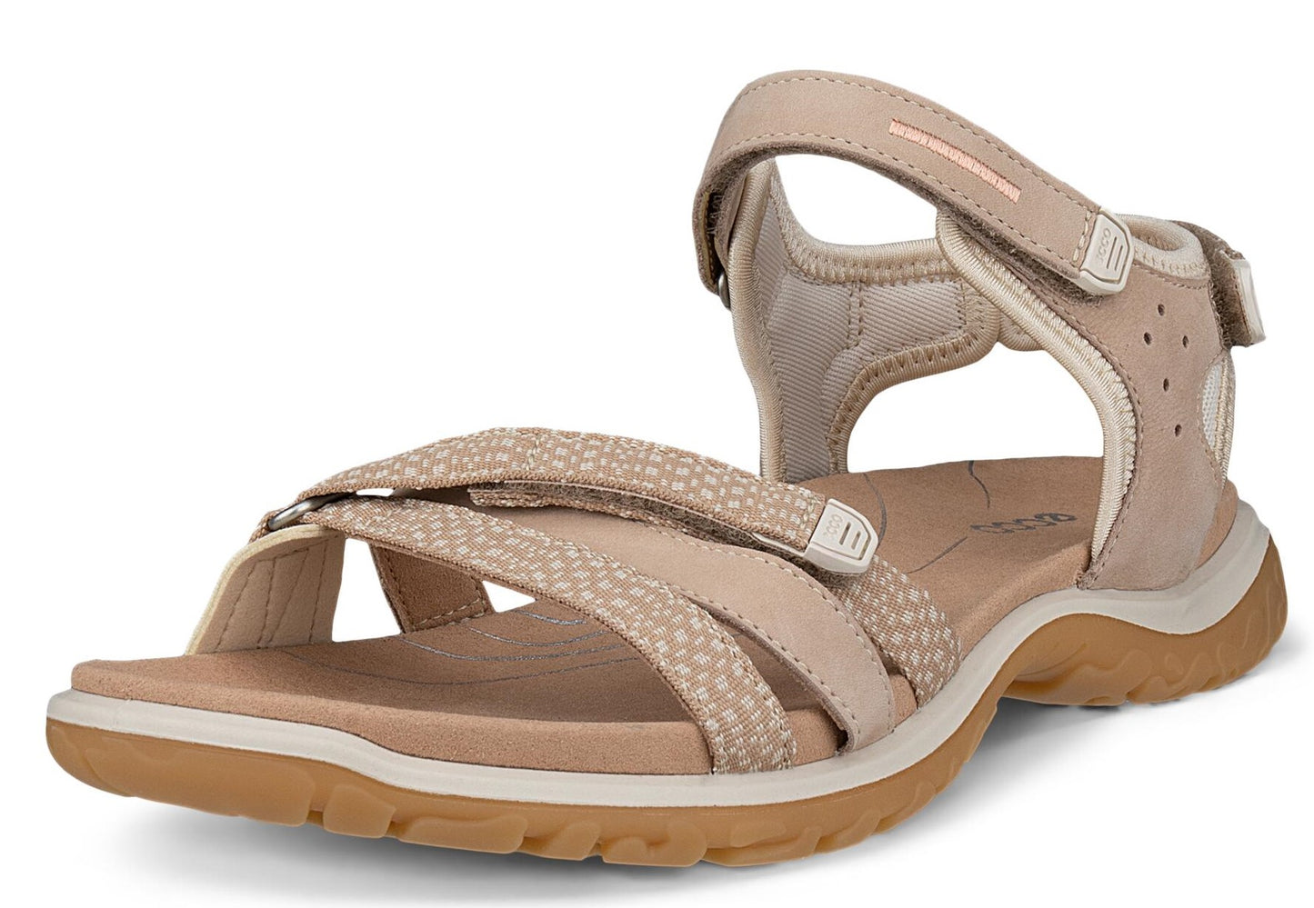 Beige sandal with adjustable hook-and-loop straps.