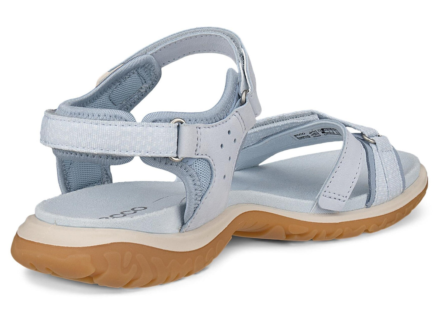 Light blue sandal with tan soles and velcro straps.