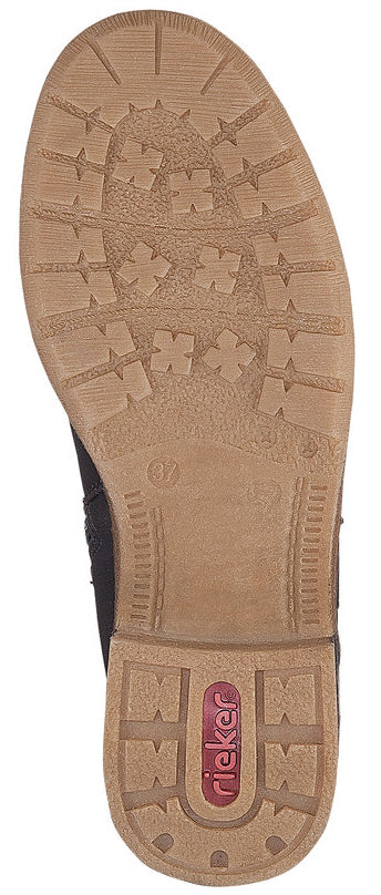The sole of a shoe. It has a tan base and various textures to improve grip. The text 'Rieker' is visible on the sole.