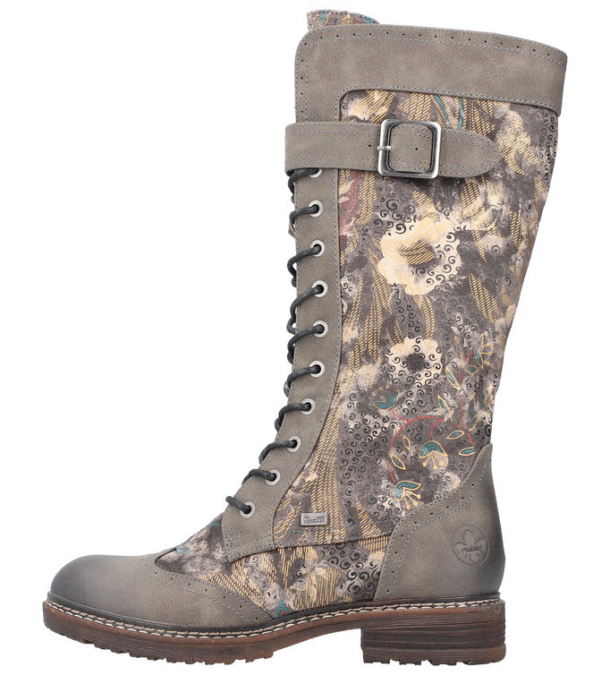 Grey floral knee-high lace-up boot with buckled strap.
