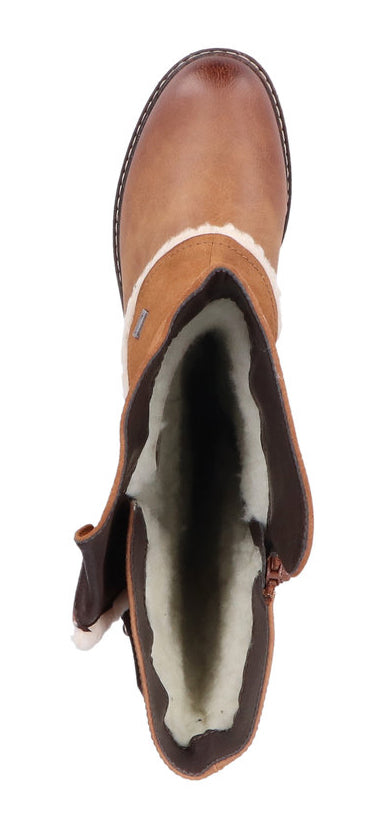 A top down shot of a brown boot with a white, furry interior.