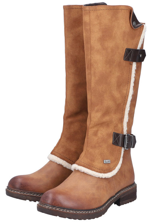 Pair of tan-colored, knee-high boots with faux fur lining and buckle accents.
