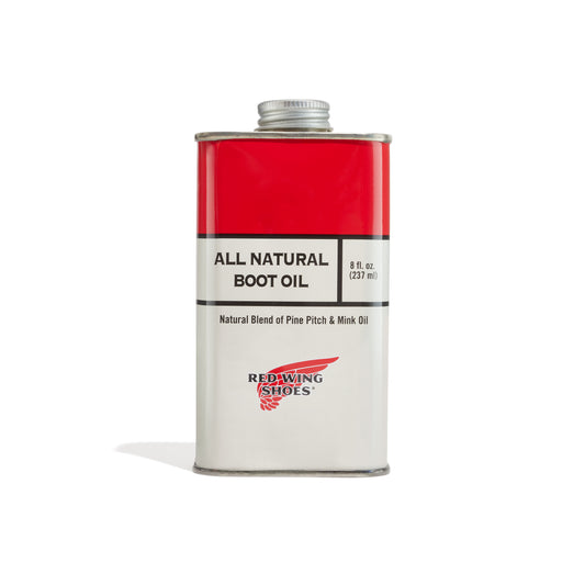 A can of boot oil with a red and white label.