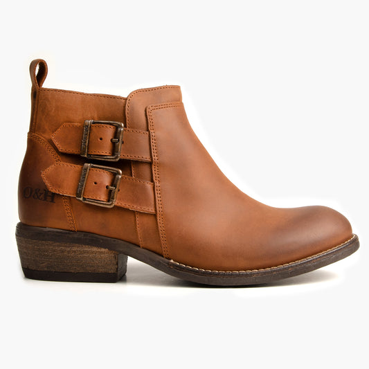 Leather ankle boot with buckle straps and a low heel.