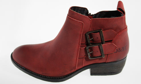 Red ankle boot with side buckle and low heel.