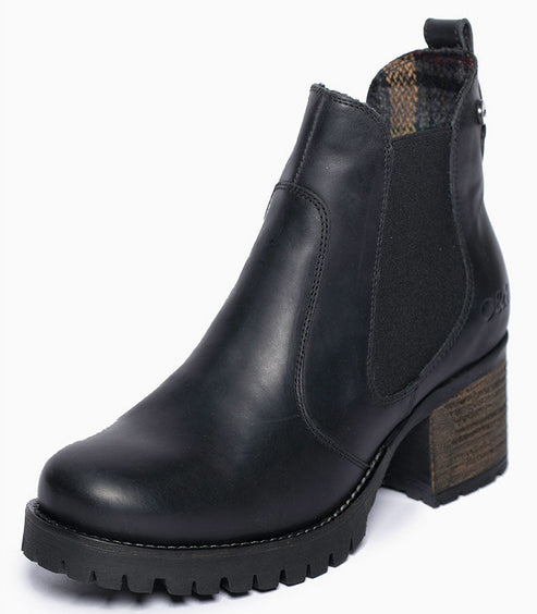 Black leather ankle boot with elastic side panels and a chunky heel and lug sole.