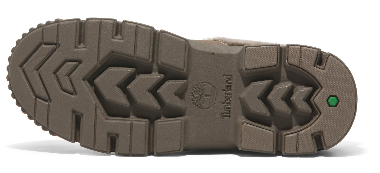 The sole of a boot shows a deep tread with Timberland logo.