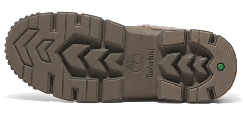 The sole of a boot shows a deep tread with Timberland logo.