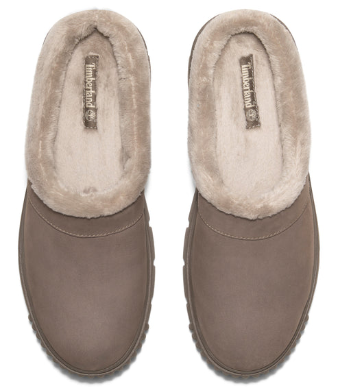 Pair of brown slippers with faux fur trim and Timberland tag on inner sole.