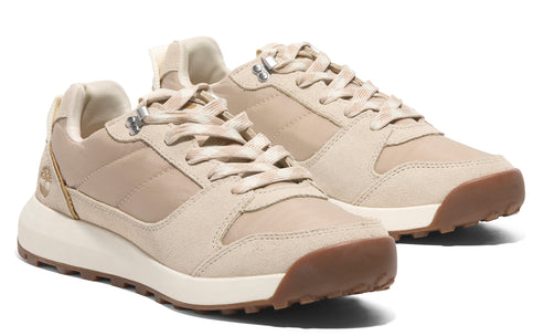 Beige leather sneaker with brown outsole and beige laces.