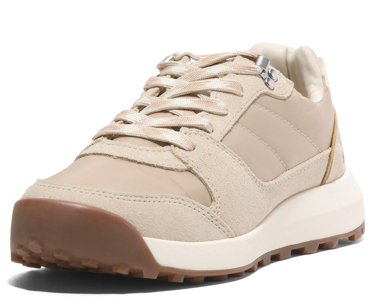 Tan-colored lace-up sneaker with brown rubber toe bumper and white midsole.