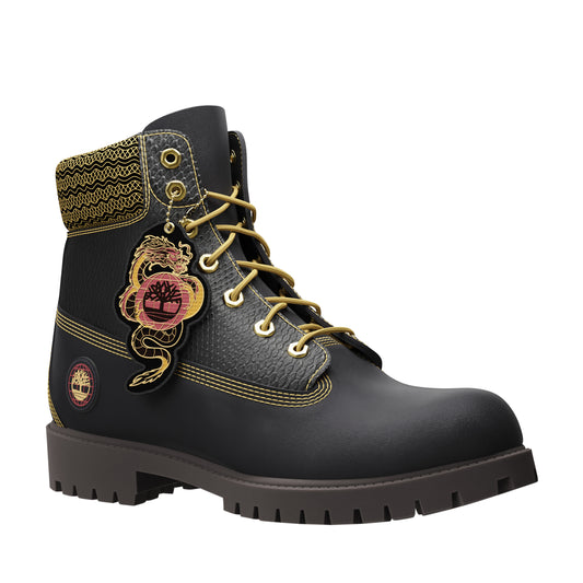 Black leather work boot with gold eyelets and laces, decorative gold-patterned trim around the collar, and an embroidered snake with a pink and red sun.