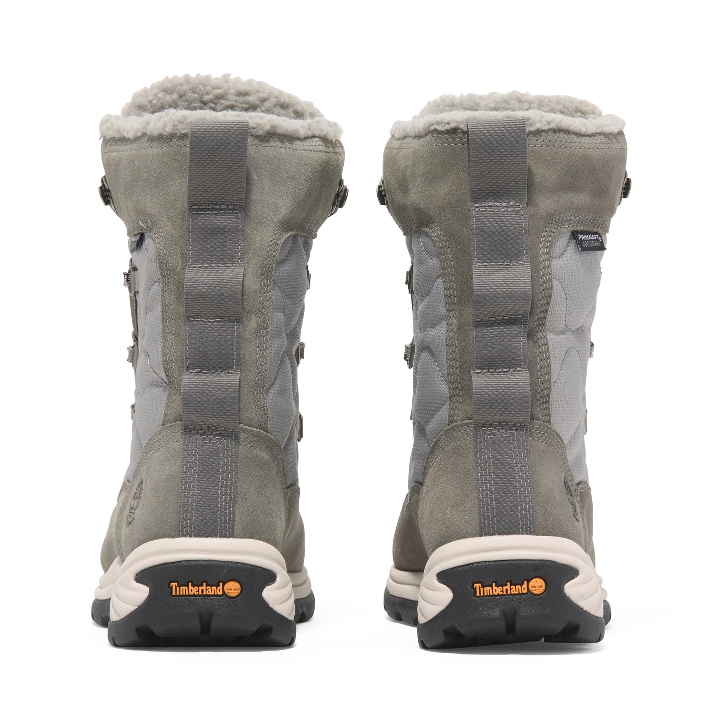 Pair of gray, knee-high, lace-up boots with quilted nylon panels and faux fur trim, viewed from the back.