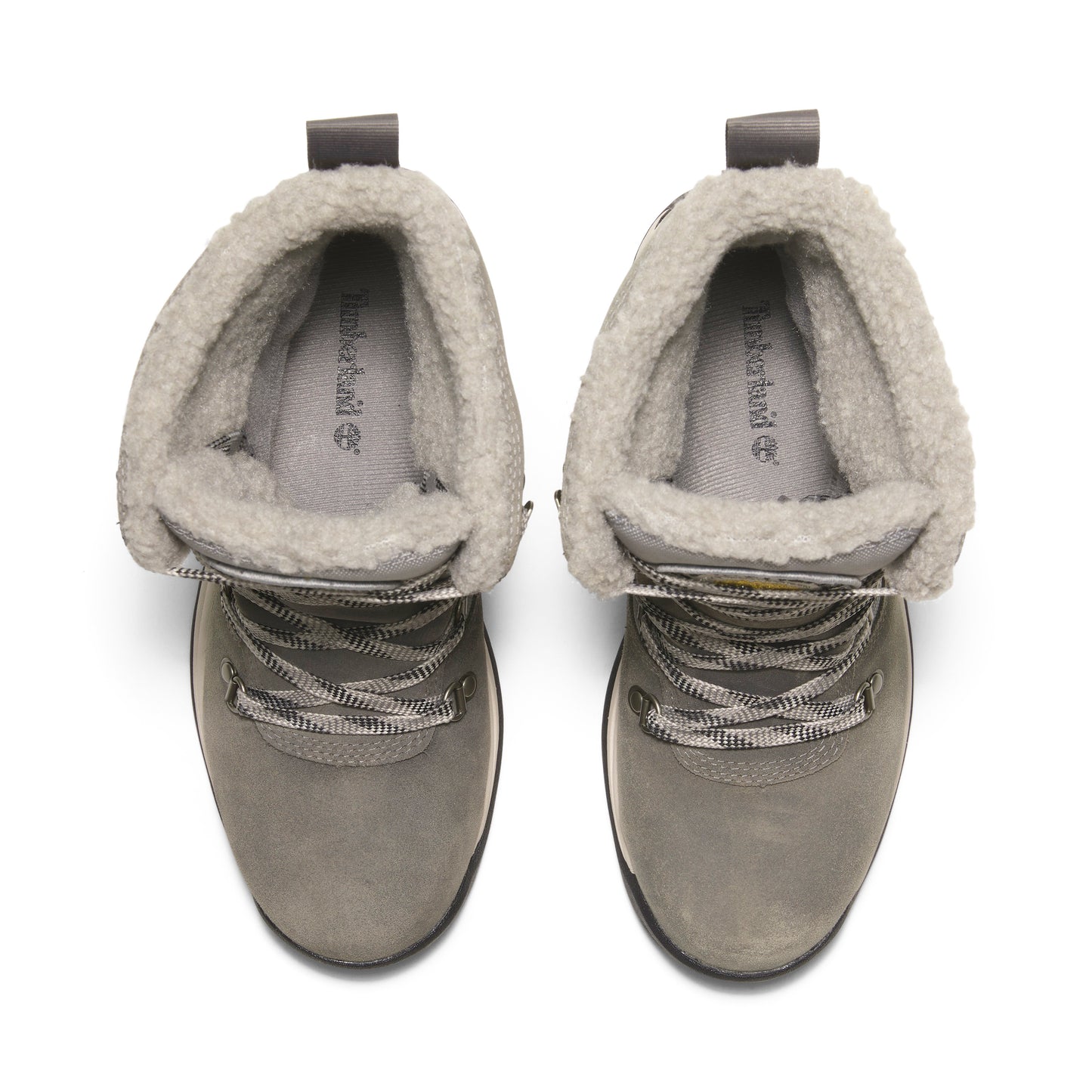 Top-down view of gray boots with fur lining and patterned laces.