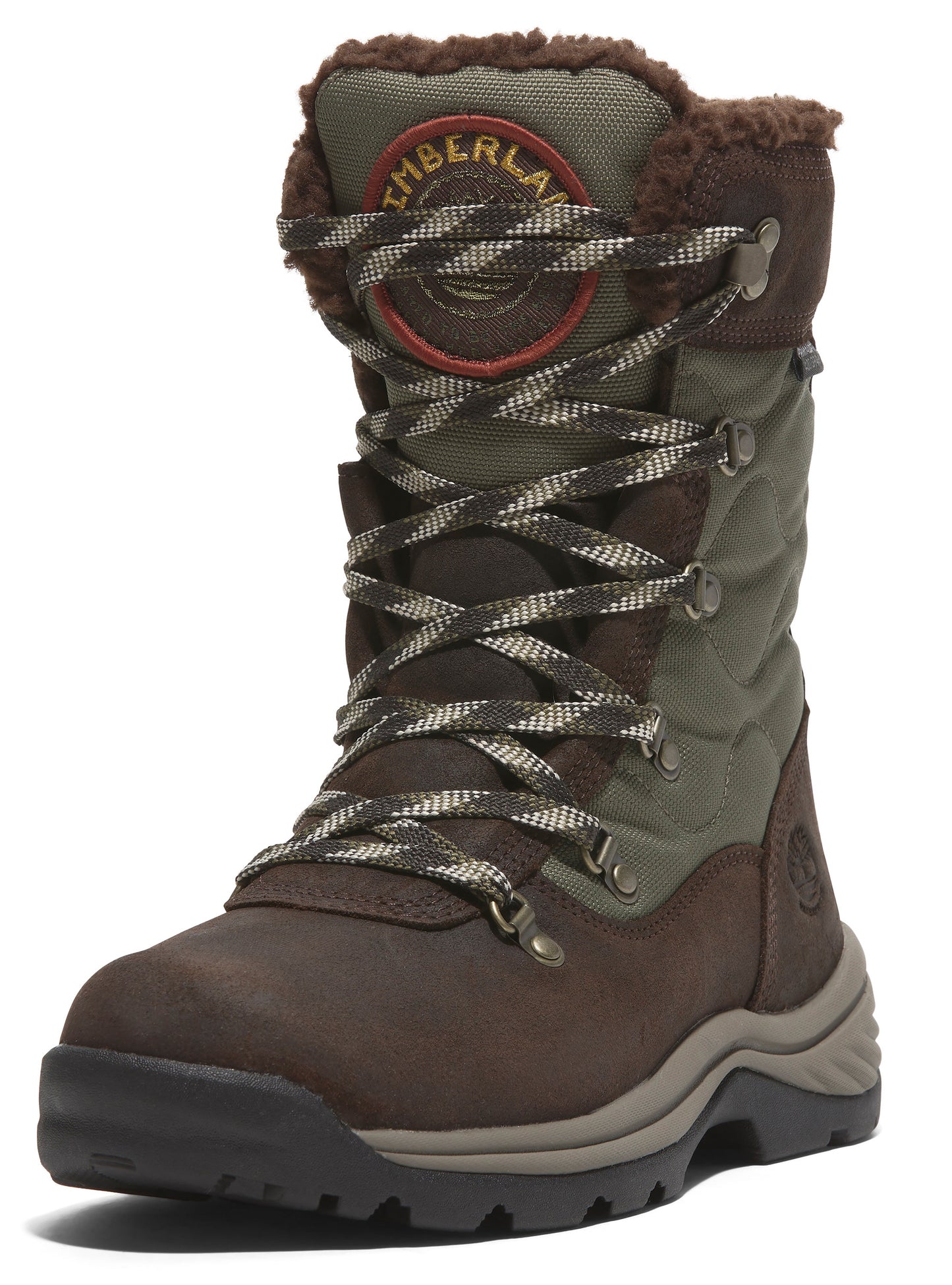 Mid-calf height, brown and green insulated boot with faux fur trim, lace-up closure, and a round, red logo patch on the side.