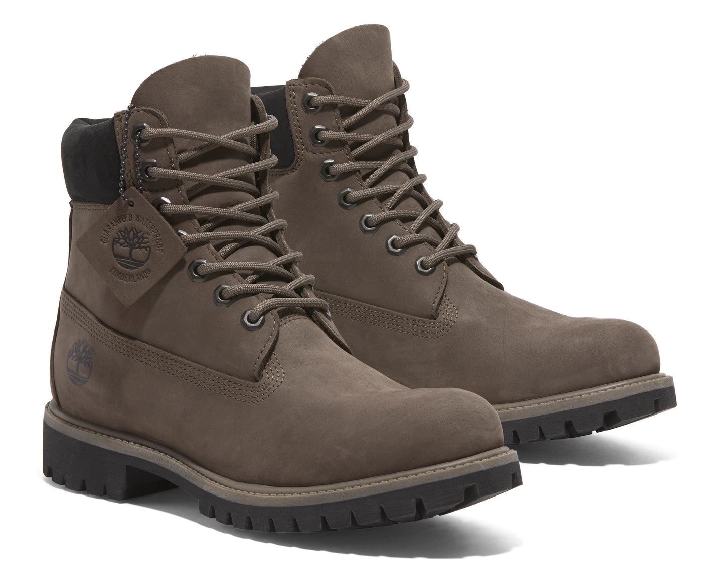 Pair of waterproof, nubuck leather work boots in taupe with laces and black padded collar.