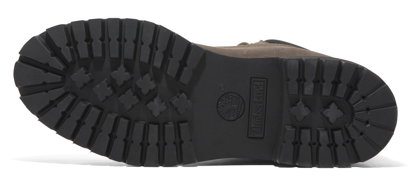 Bottom of a boot with a thick, lugged sole.