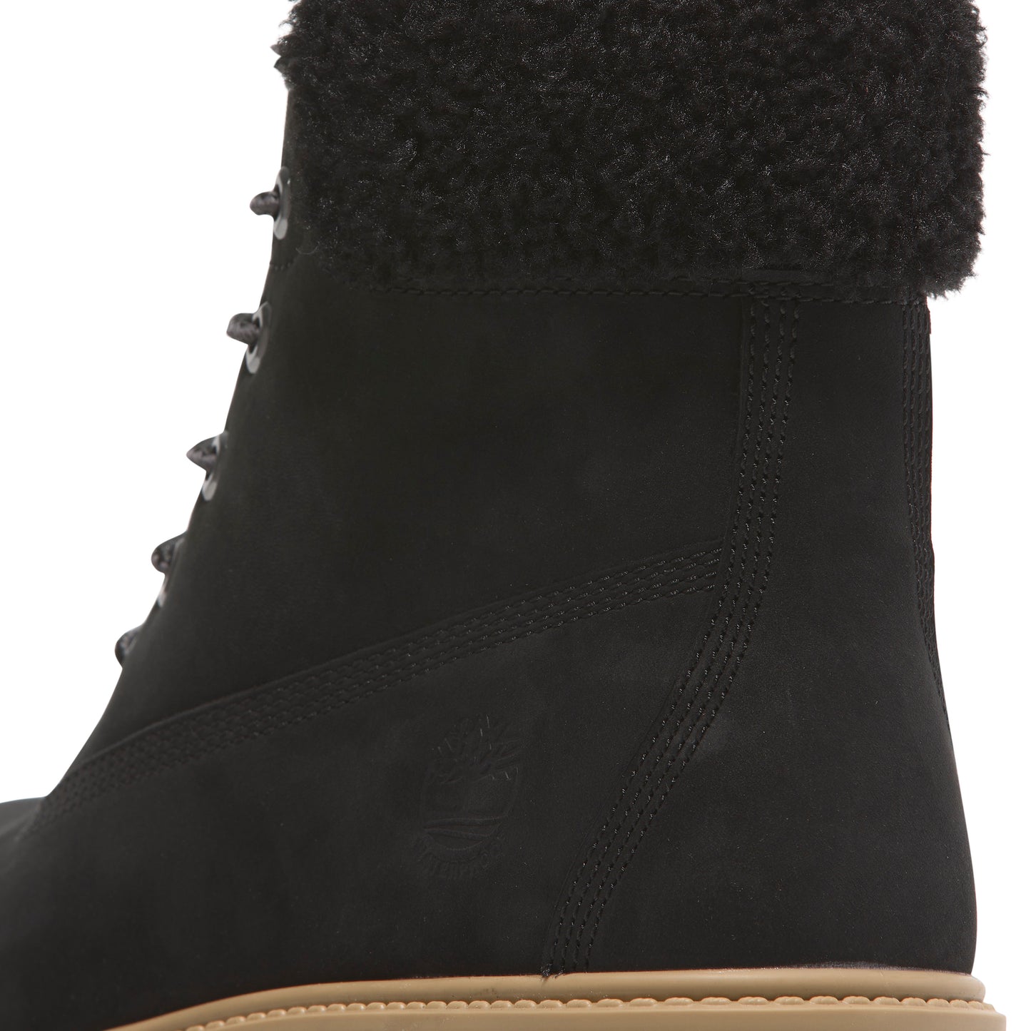Black boot with shearling collar.
