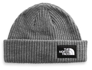 gray knit beanie with a black patch that reads "THE NORTH FACE" in white text