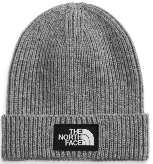 Gray ribbed beanie with a logo patch that reads THE NORTH FACE.