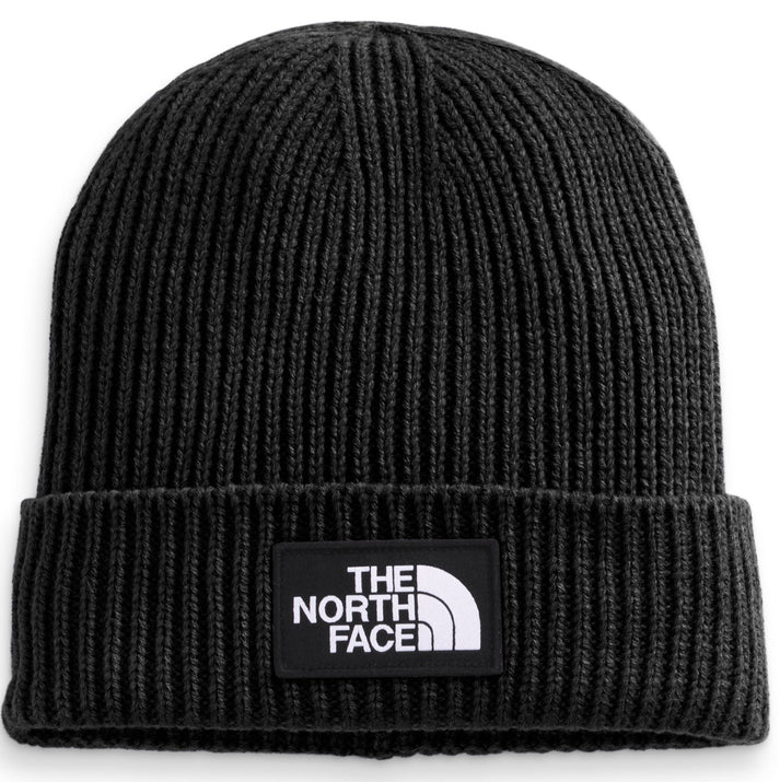 Black knit beanie with a white logo patch.