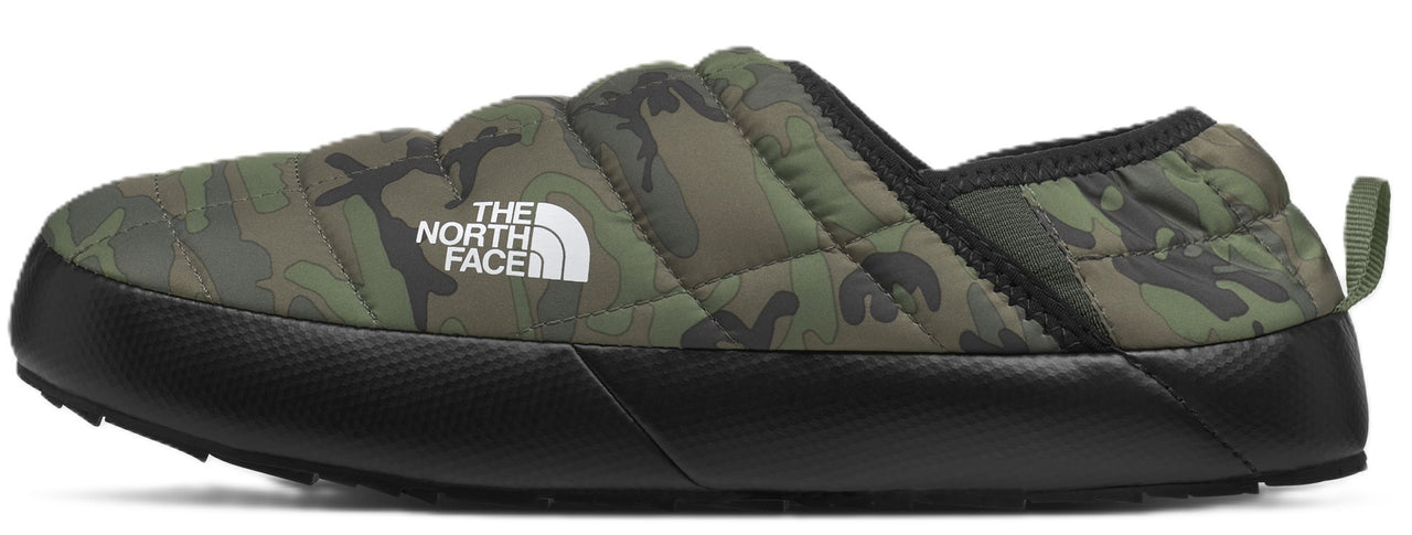 Camouflage slipper with a black sole and a pull tab at the heel.