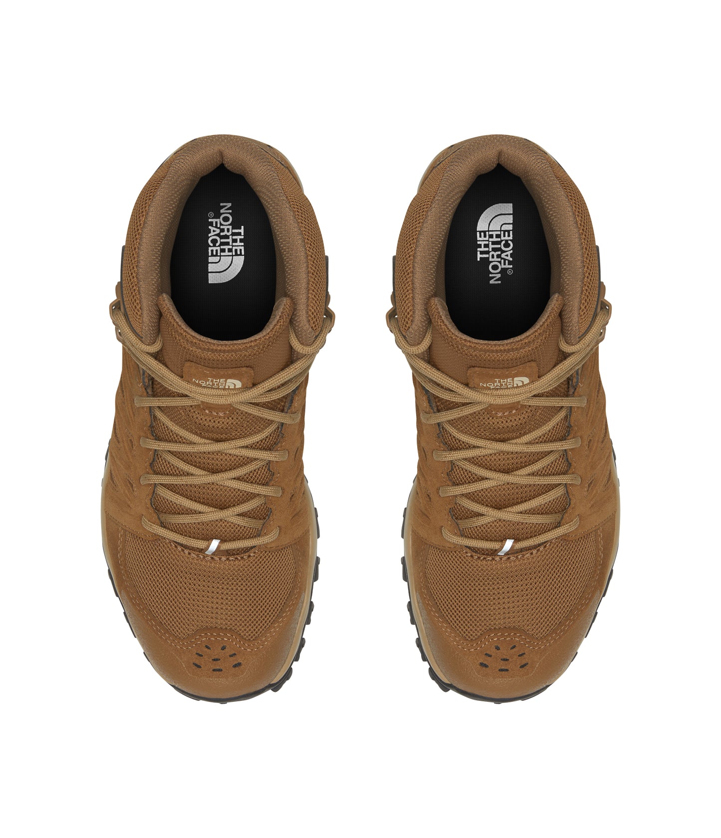 Pair of tan mid-height boots with laced closure, textured side panels, and visible logos inside.