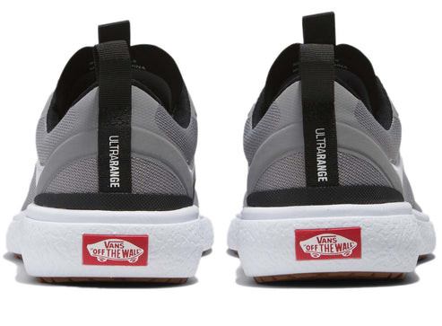 Two rear-facing views of grey Ultrarange shoes with a white midsole and a red Vans "Off The Wall" logo.