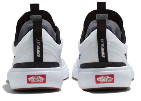 Rear view of white sneakers with black trim and "ULTRARANGE" text on the heel pull tab. Red "OFF THE WALL" label on the heel.
