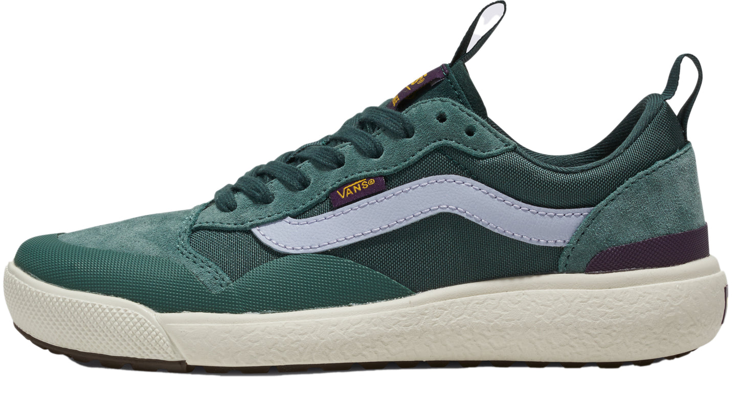 A green low-top sneaker with a light purple stripe.