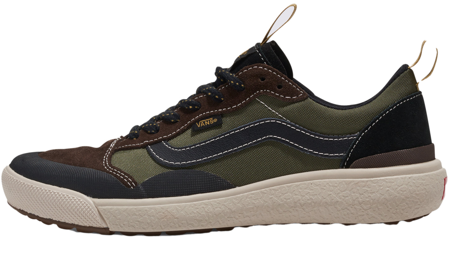Low profile shoe with brown suede heel and toe, olive green canvas body, black curved stripe on the side, beige sole, and black laces.