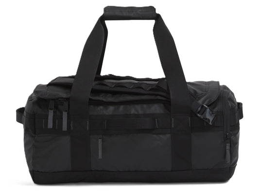 Black duffel bag with handles and straps.