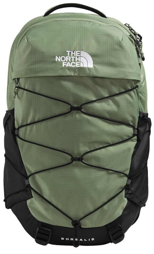 Green backpack with elastic black cords crisscrossing the front and a white logo.