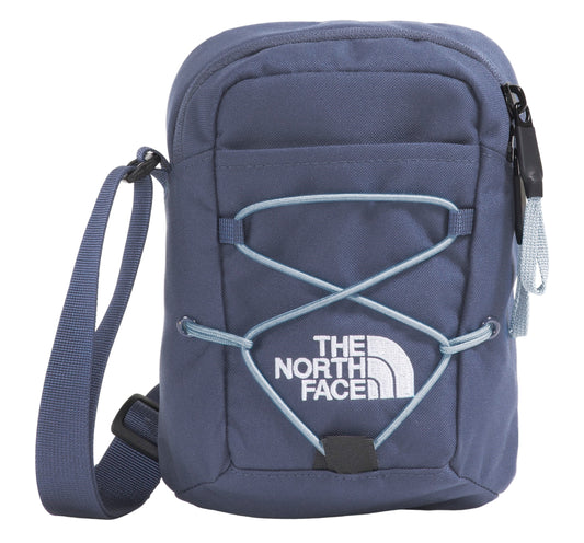 Blue cross-body bag with light blue bungee cord design, adjustable shoulder strap, and white logo.