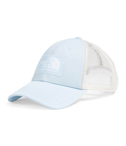Light blue trucker hat with white mesh back and white square logo on the front.