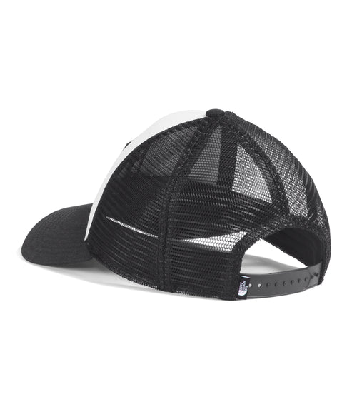 The rear view of a black and white baseball cap with a black mesh back and an adjustable strap.