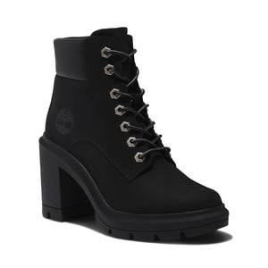 A black lace-up boot with a chunky heel.