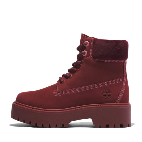 Maroon suede-like boot with a thick, lugged sole.