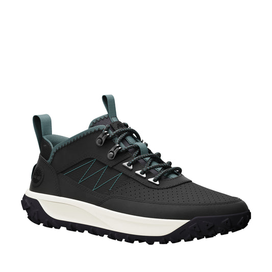 A black trail shoe with matching laces and a white midsole.