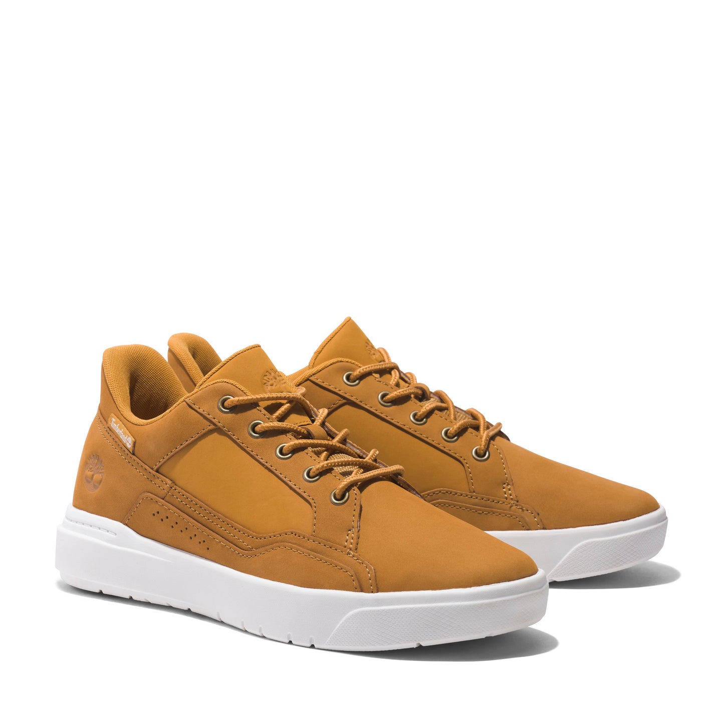 Pair of brown leather sneakers with white soles and light brown laces.