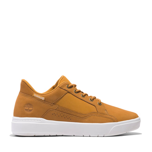 Side view of an wheat-colored sneaker with a white sole and perforated details.