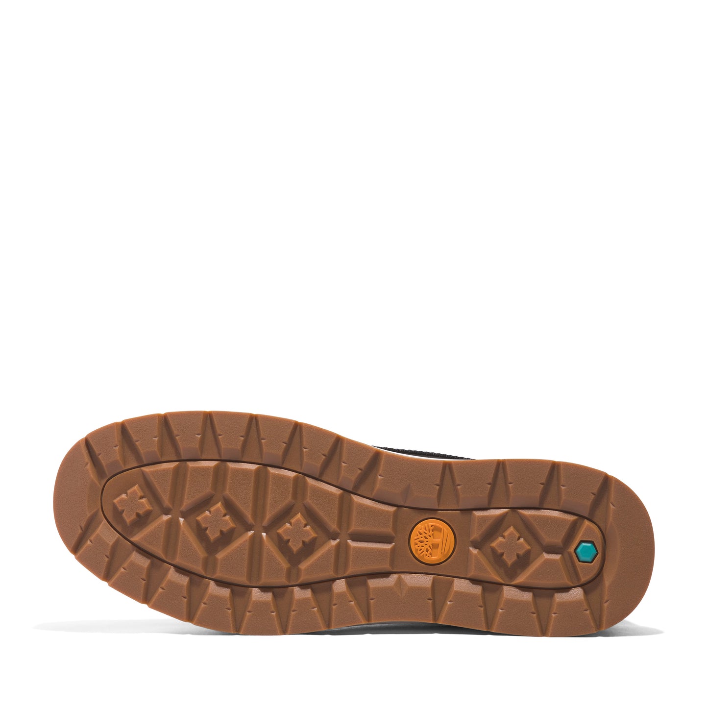 Sole of a brown boot with diamond and flower patterns.