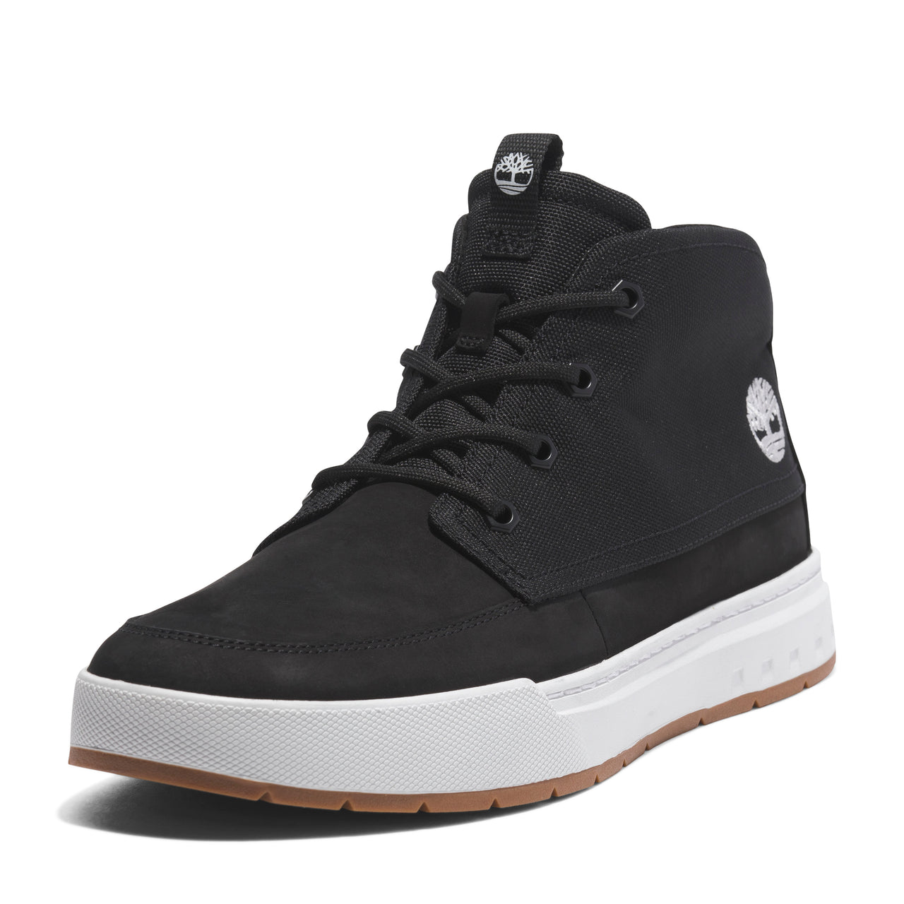 Black, mid-top sneaker with a white sole and a light brown base, laced.