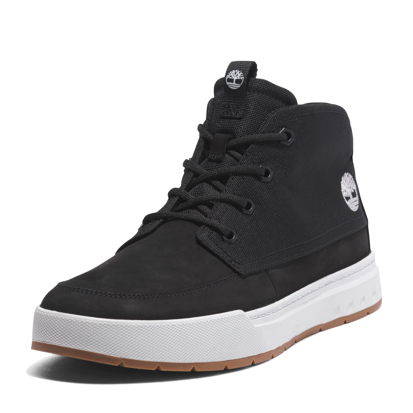 Black, mid-top sneaker with a white sole and a light brown base, laced.