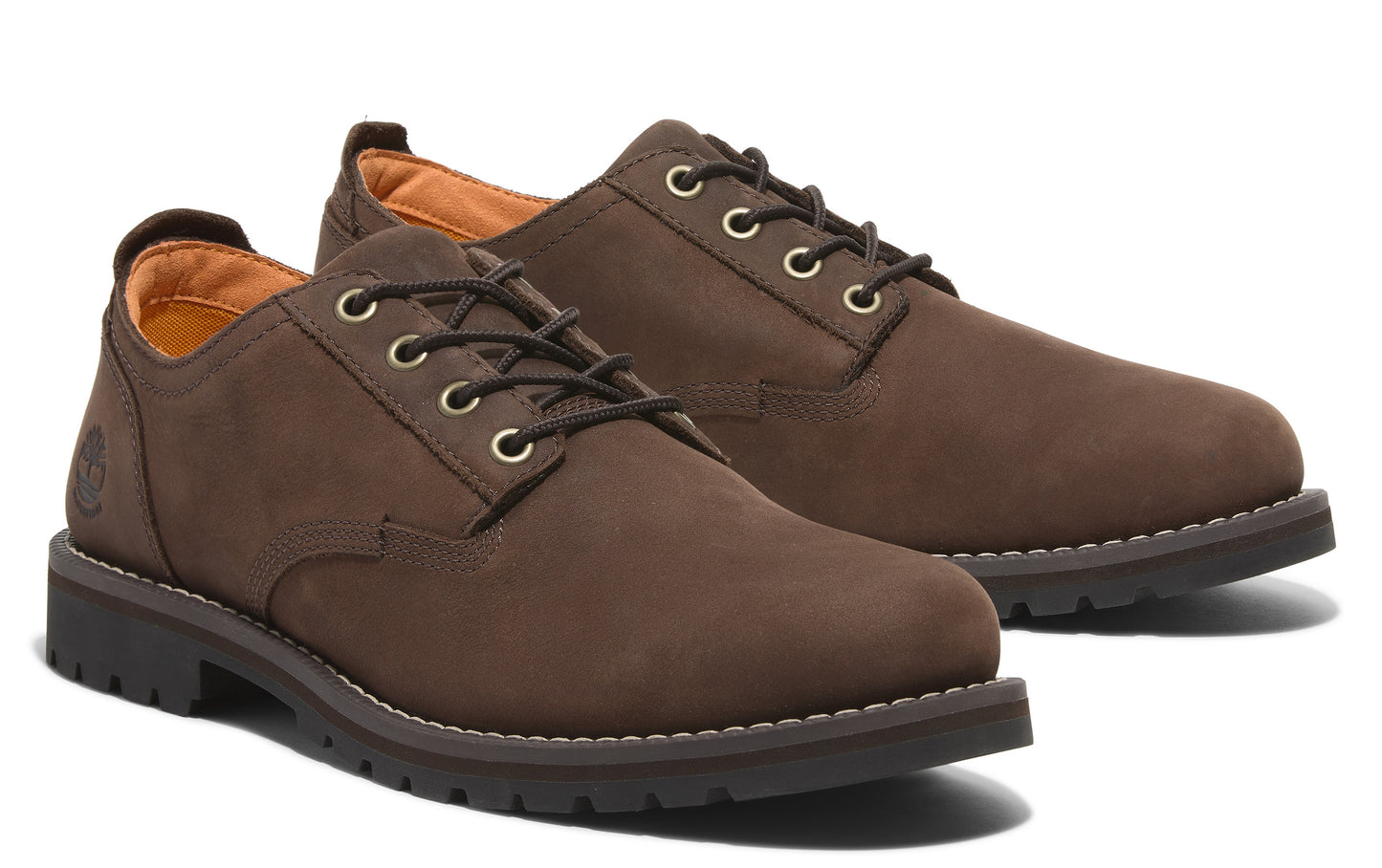 A pair of brown leather, lace-up dress shoes with a round toe and rubber sole.