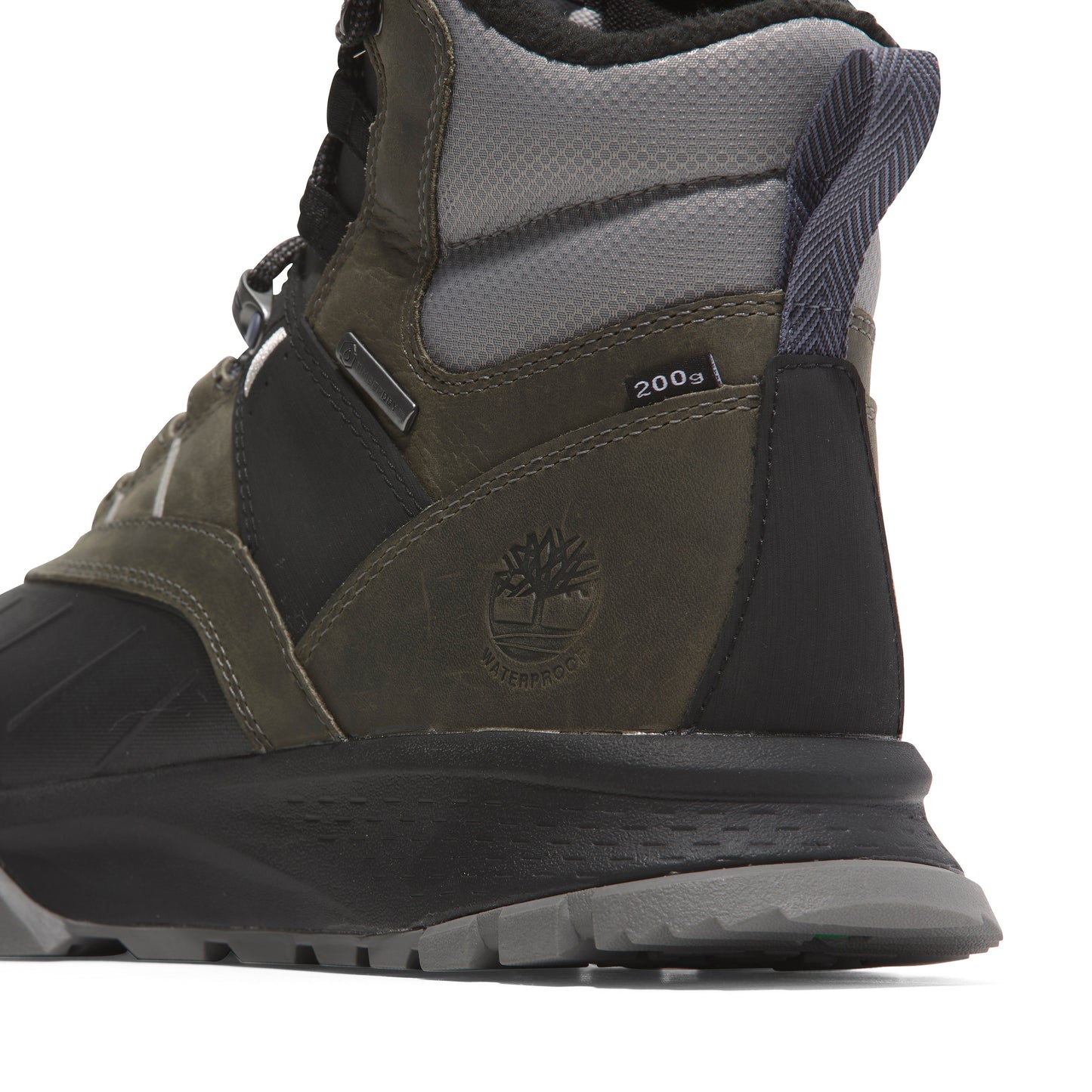 Close-up of a waterproof boot with a black toe, green middle, and gray top. The heel has a dark gray tab with a herringbone pattern and the number "200g" visible.