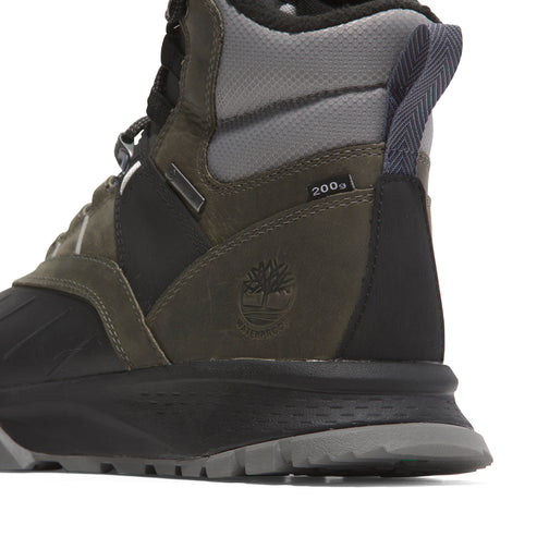 Close-up of a waterproof boot with a black toe, green middle, and gray top. The heel has a dark gray tab with a herringbone pattern and the number "200g" visible.