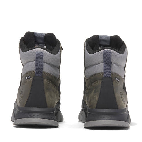 A pair of Timberland boots, rear view; green and black nubuck leather, with gray padded collars and black soles.