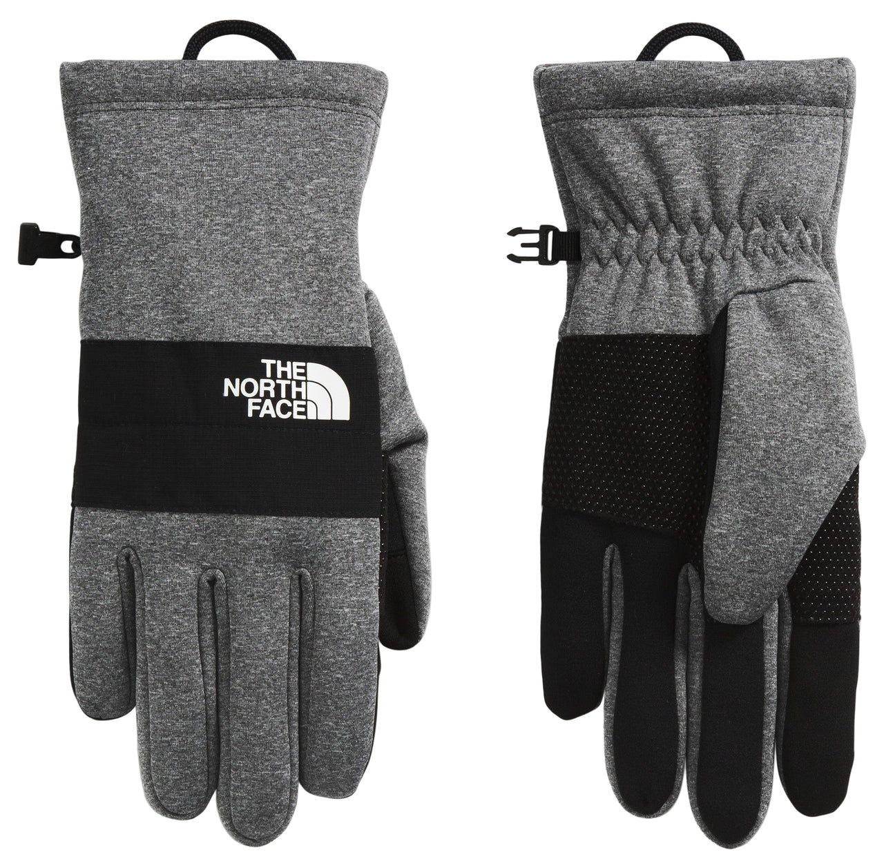 Pair of gray fleece gloves with a black band, THE NORTH FACE logo, black fingertips and adjustable wrist buckle.